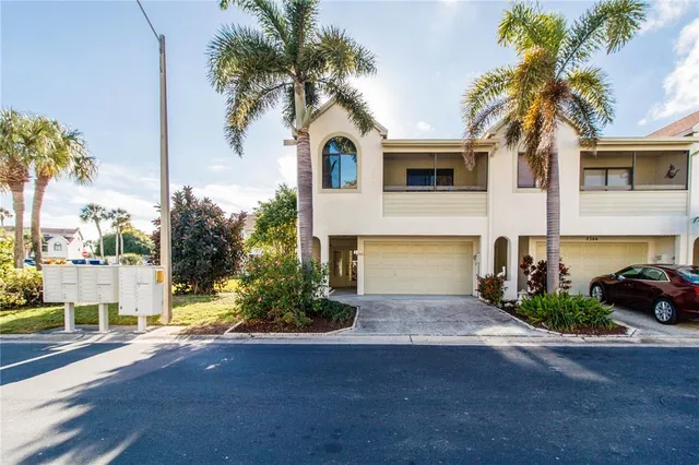 an aerial view of houses with outdoor space
