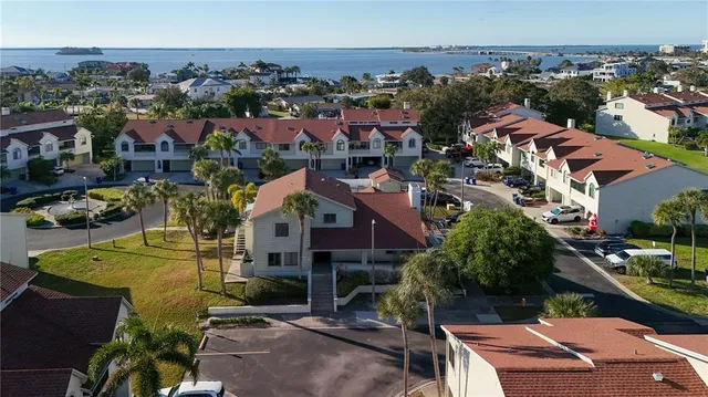 an aerial view of a house with a garden