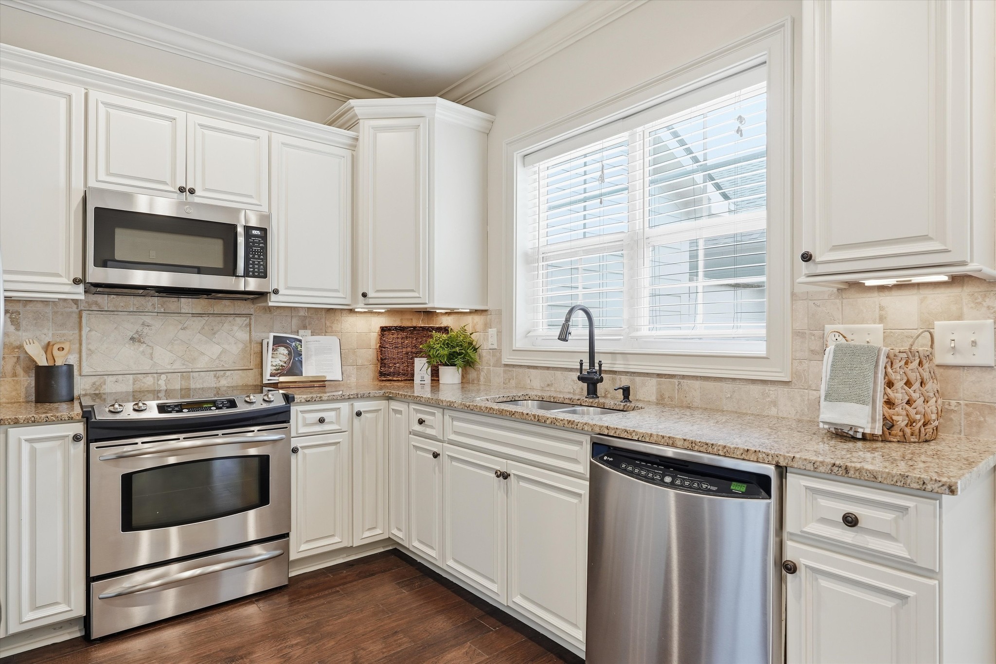 4213 Prestwick Place Spring Hill, TN 37174 - Photo 17 of 52 a kitchen with granite countertop white cabinets white stainless steel appliances a sink and a window