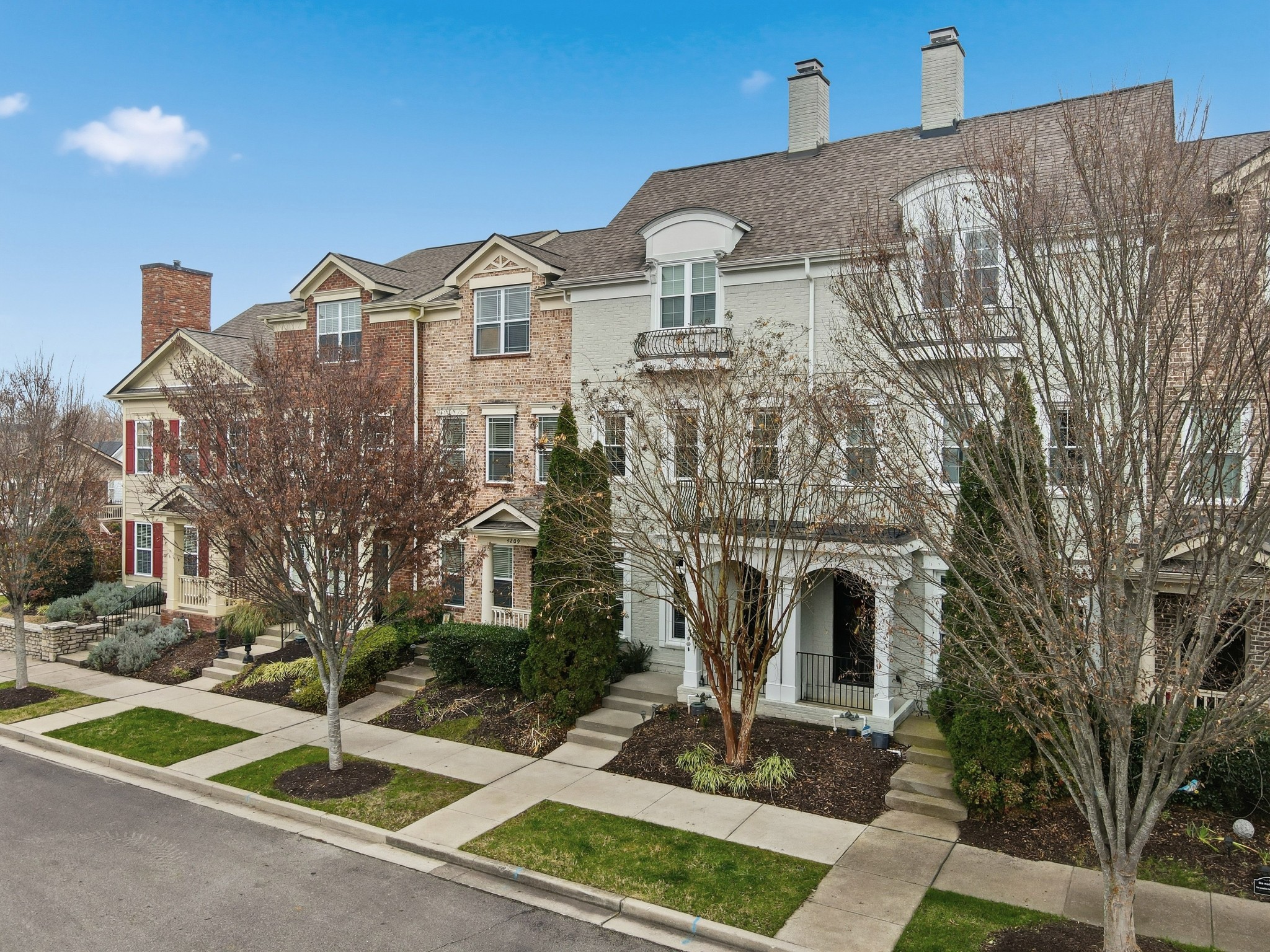 4213 Prestwick Place Spring Hill, TN 37174 - Photo 2 of 52 a front view of a house with garden