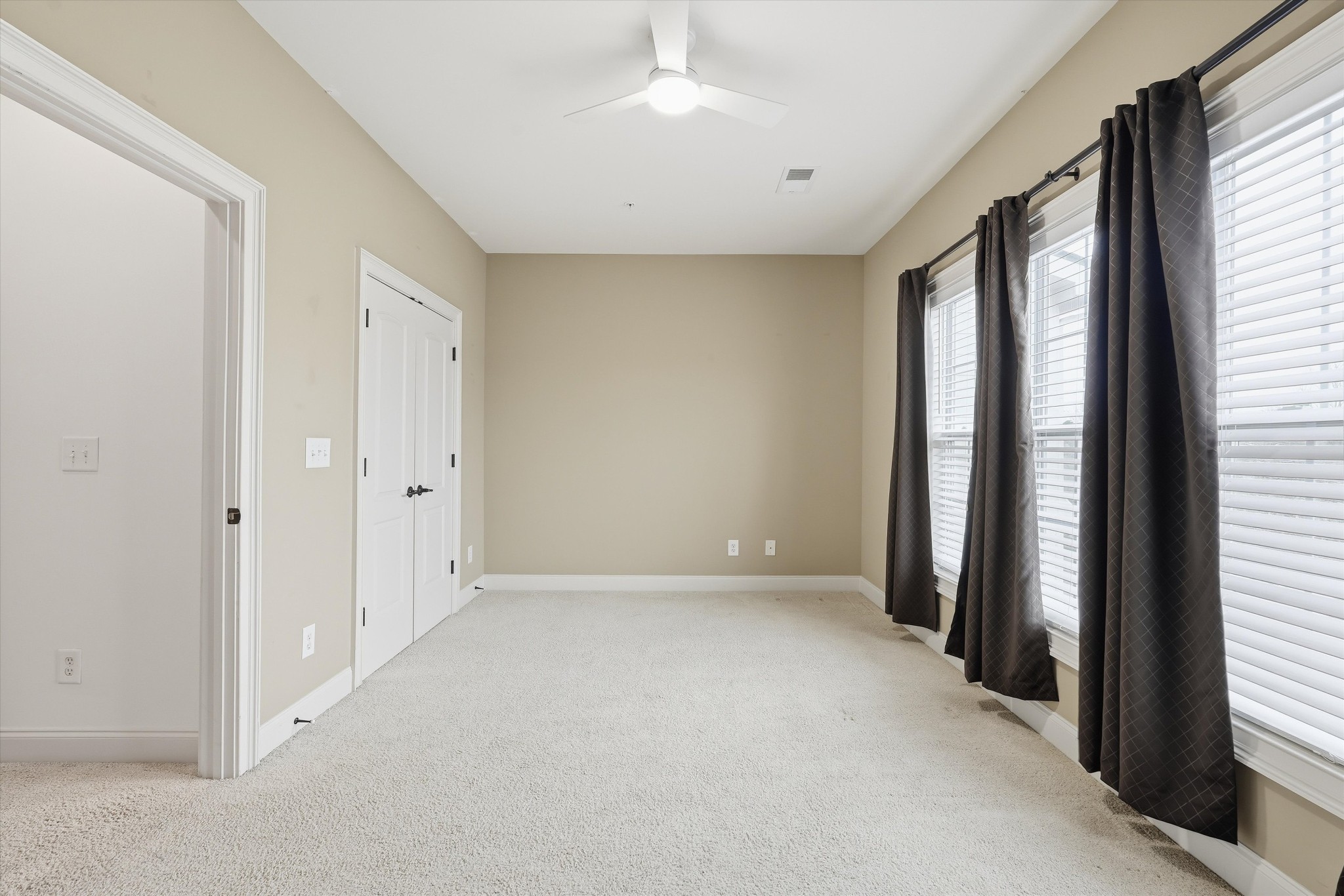 4213 Prestwick Place Spring Hill, TN 37174 - Photo 36 of 52 an empty room with windows and closet area