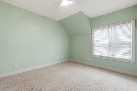an empty room with a bathroom