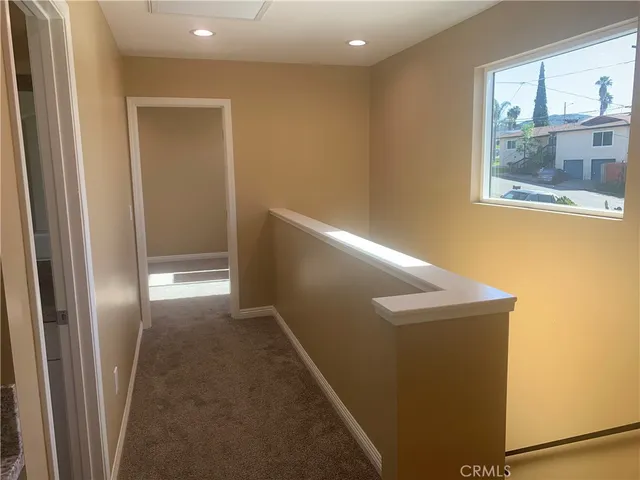 a view of hallway with window