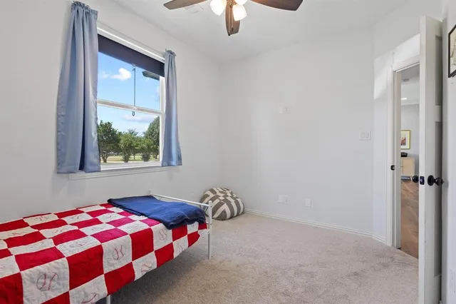 a living room with large windows