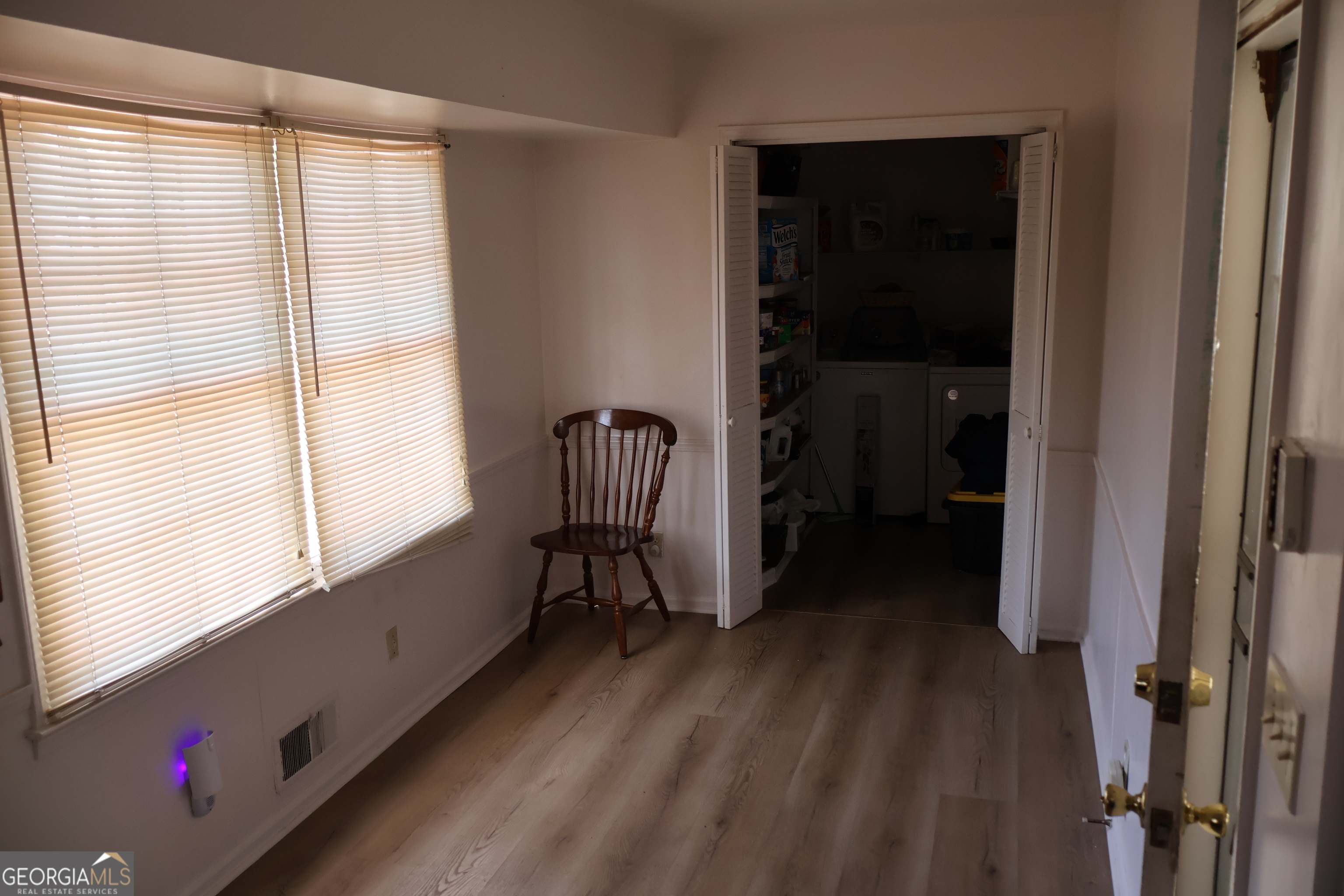 2745 Aquamist Drive Decatur, GA 30034 - Photo 6 of 9 a view of a hallway with wooden floor and a window