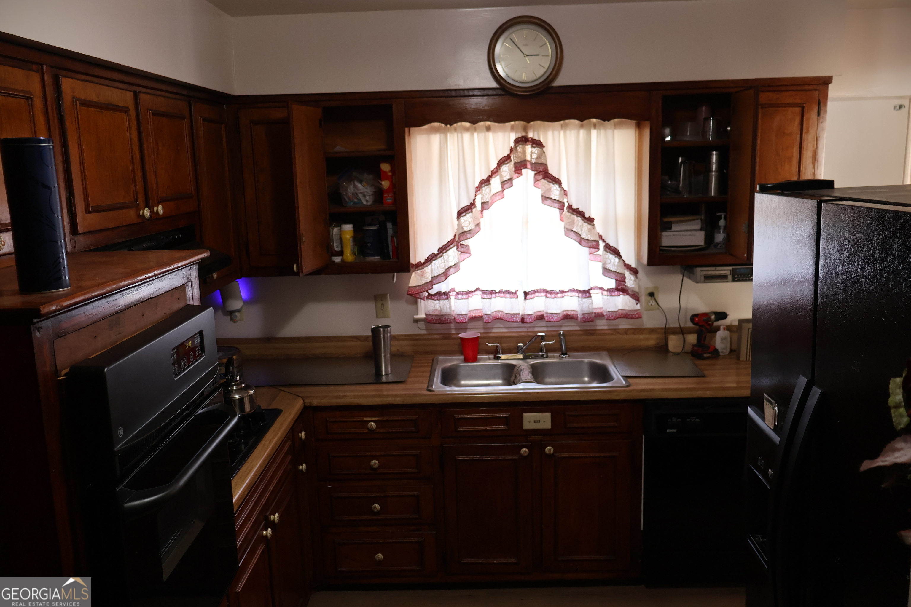 2745 Aquamist Drive Decatur, GA 30034 - Photo 9 of 9 a kitchen with a stove and a wooden floor