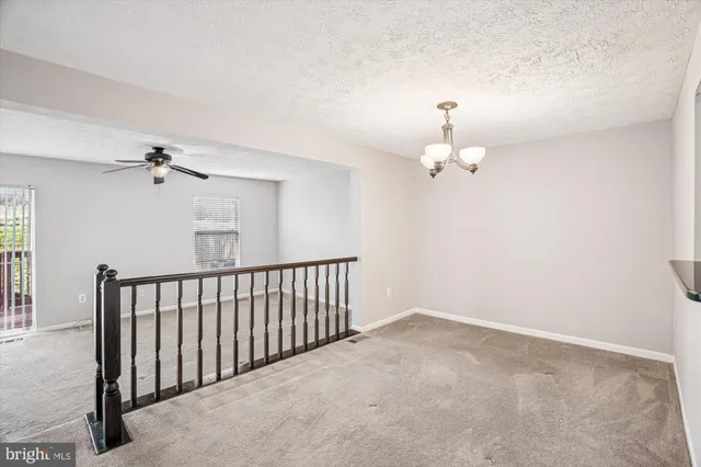 a view of a chandelier in a room