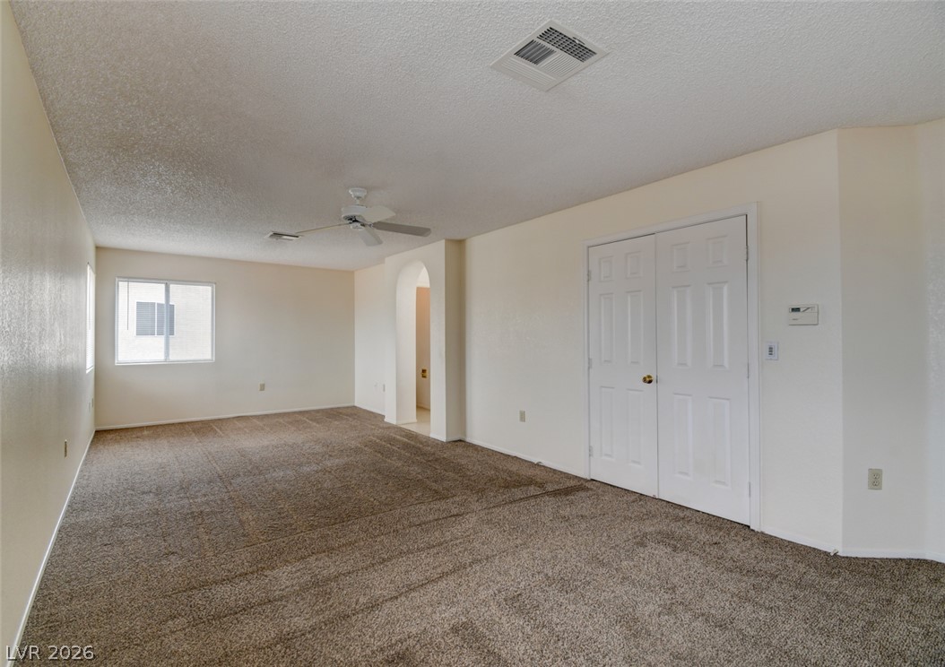 5 Tarryall Terrace Henderson, NV 89074 - Photo 33 of 44 Ample floor space and well-lit interiors characterize this comfortable bedroom.