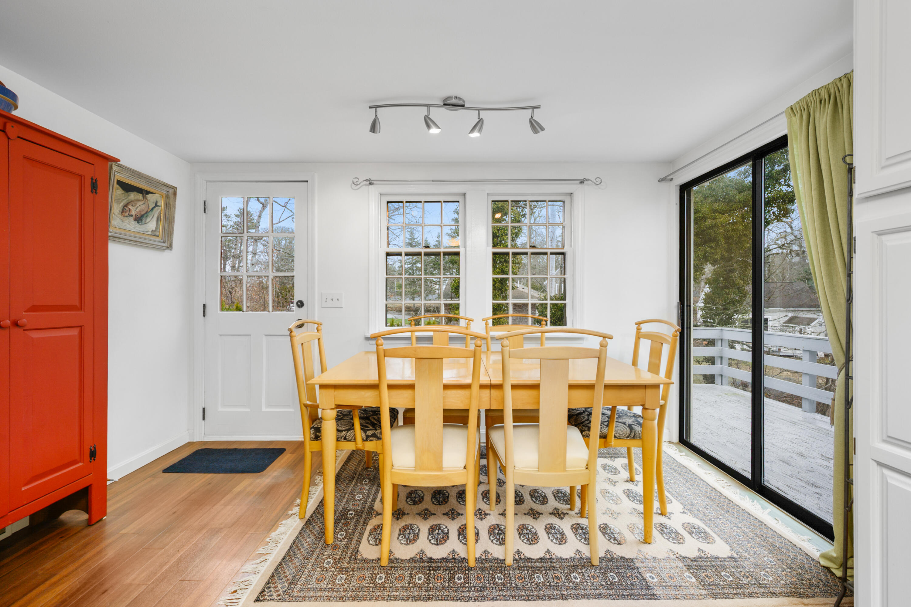 1157 Orleans-Harwich Road Harwich, MA 02645 - Photo 13 of 41 a view of a dining room with furniture window and wooden floor