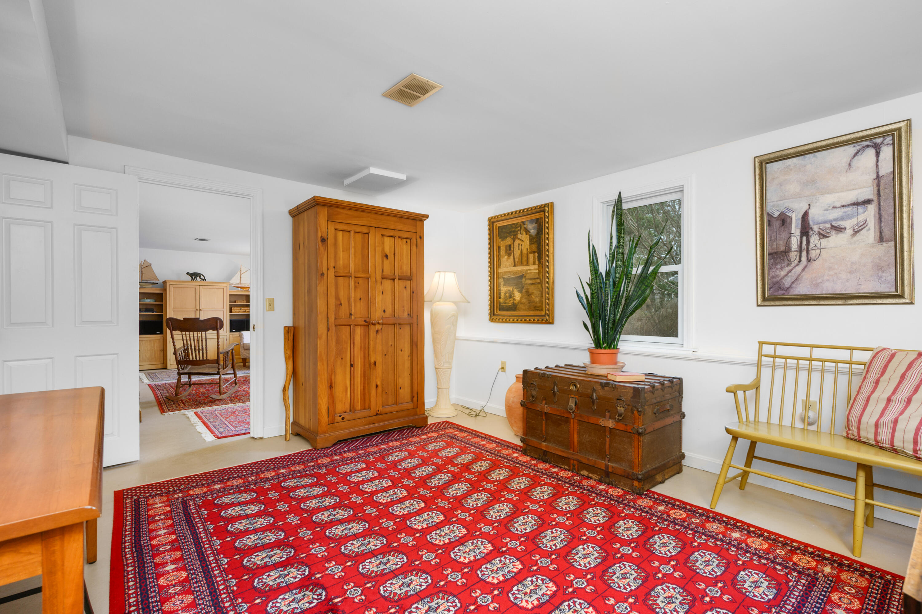 1157 Orleans-Harwich Road Harwich, MA 02645 - Photo 24 of 41 a bedroom with furniture and a window