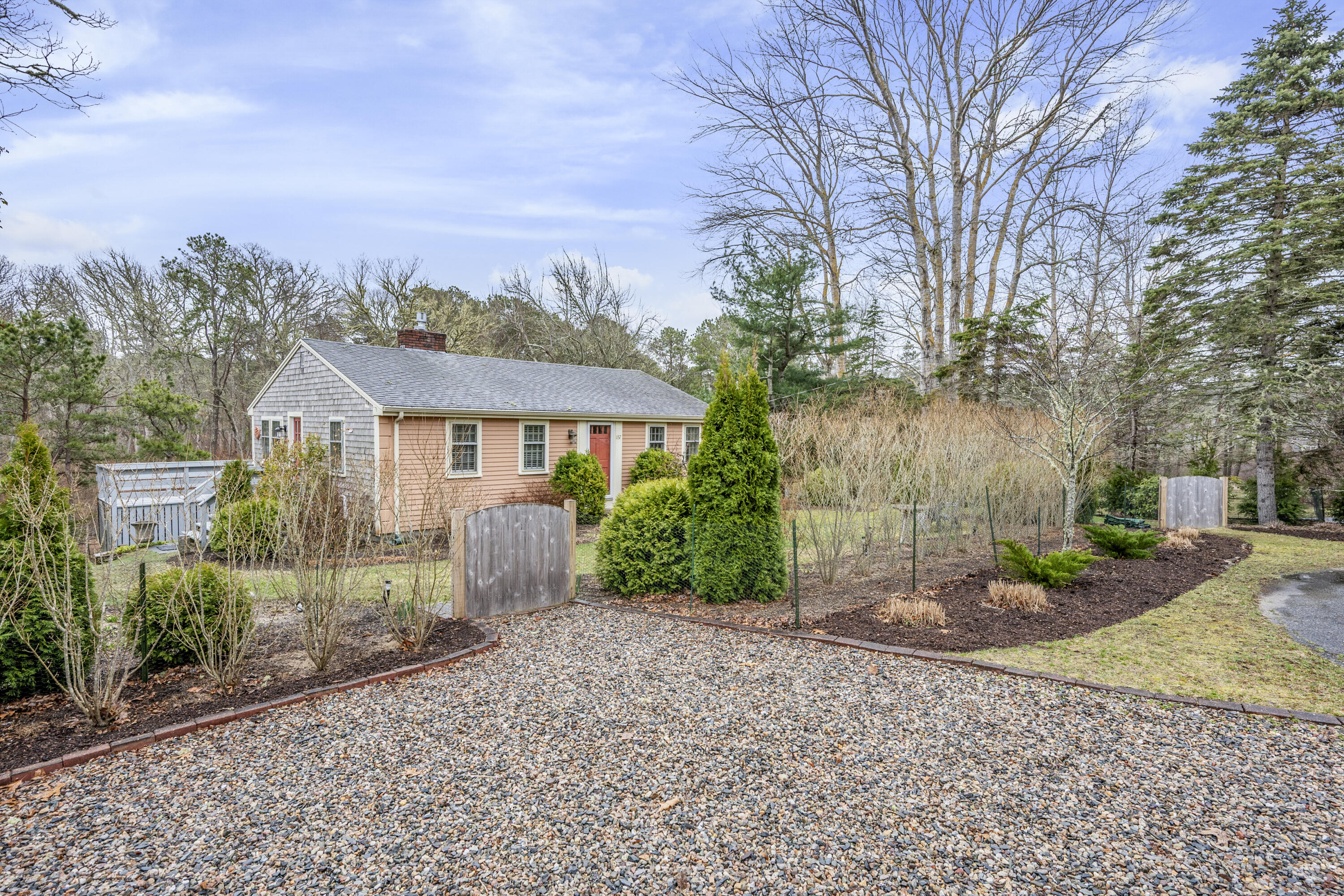 1157 Orleans-Harwich Road Harwich, MA 02645 - Photo 27 of 41 a front view of a house with garden