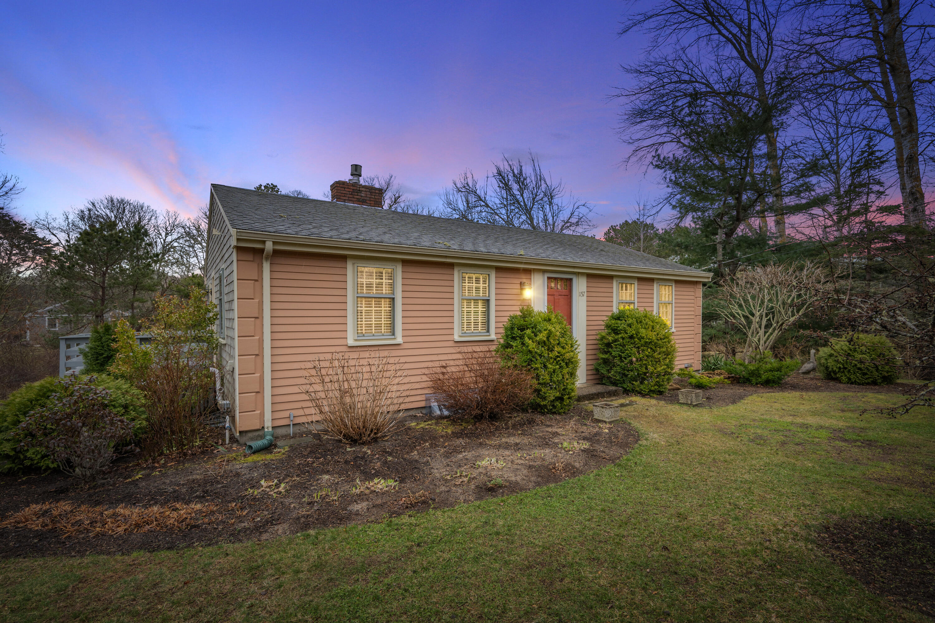 1157 Orleans-Harwich Road Harwich, MA 02645 - Photo 39 of 41 a front view of a house with garden