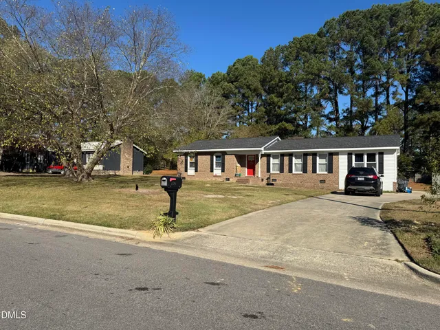 a front view of house with yard