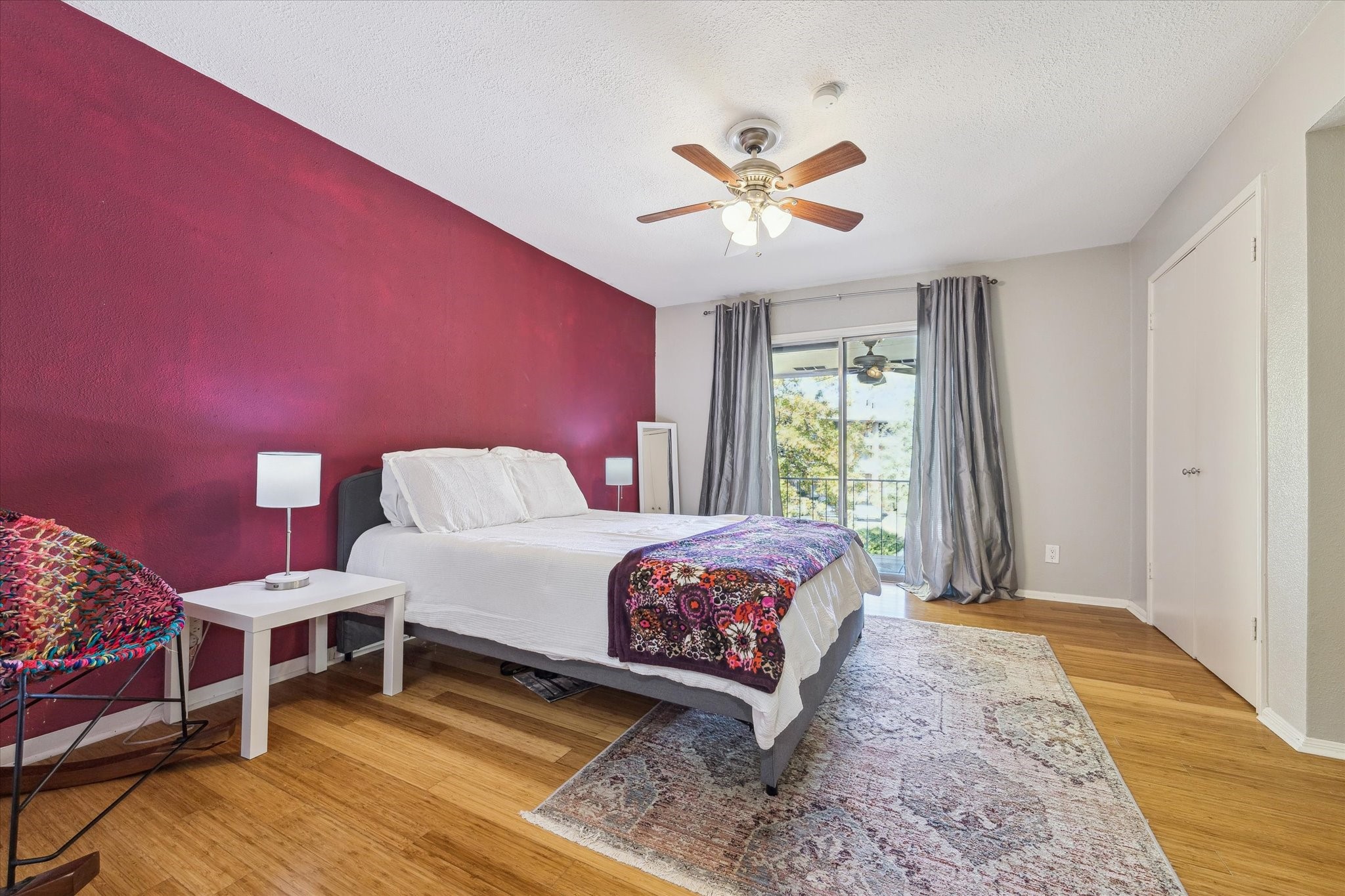 6465 Bayou Glen Road Houston, TX 77057 - Photo 8 of 15 a bedroom with a bed and a chandelier