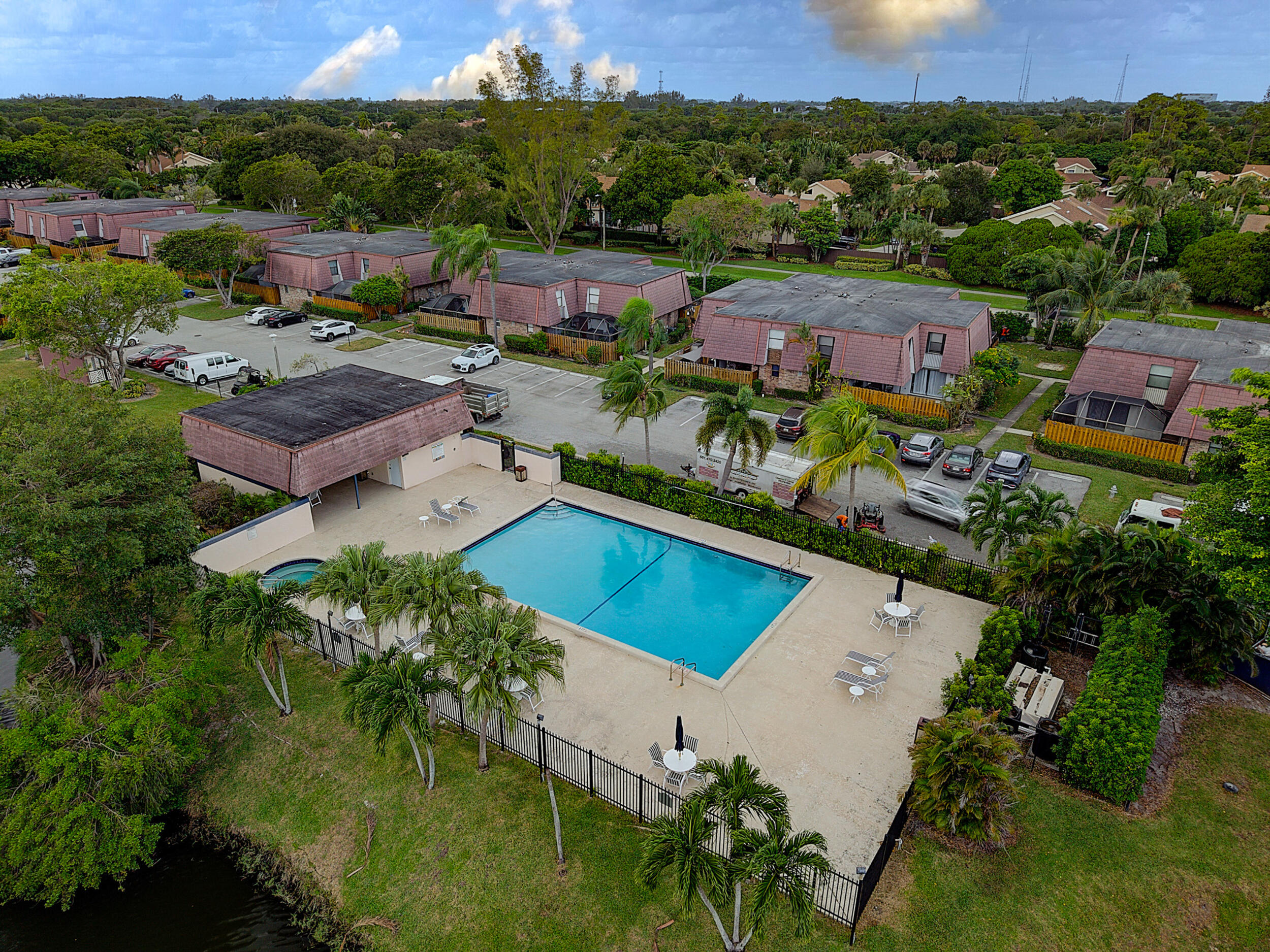 7690 Courtyard Run West Boca Raton, FL 33433 - Photo 19 of 22 an aerial view of multiple houses with yard
