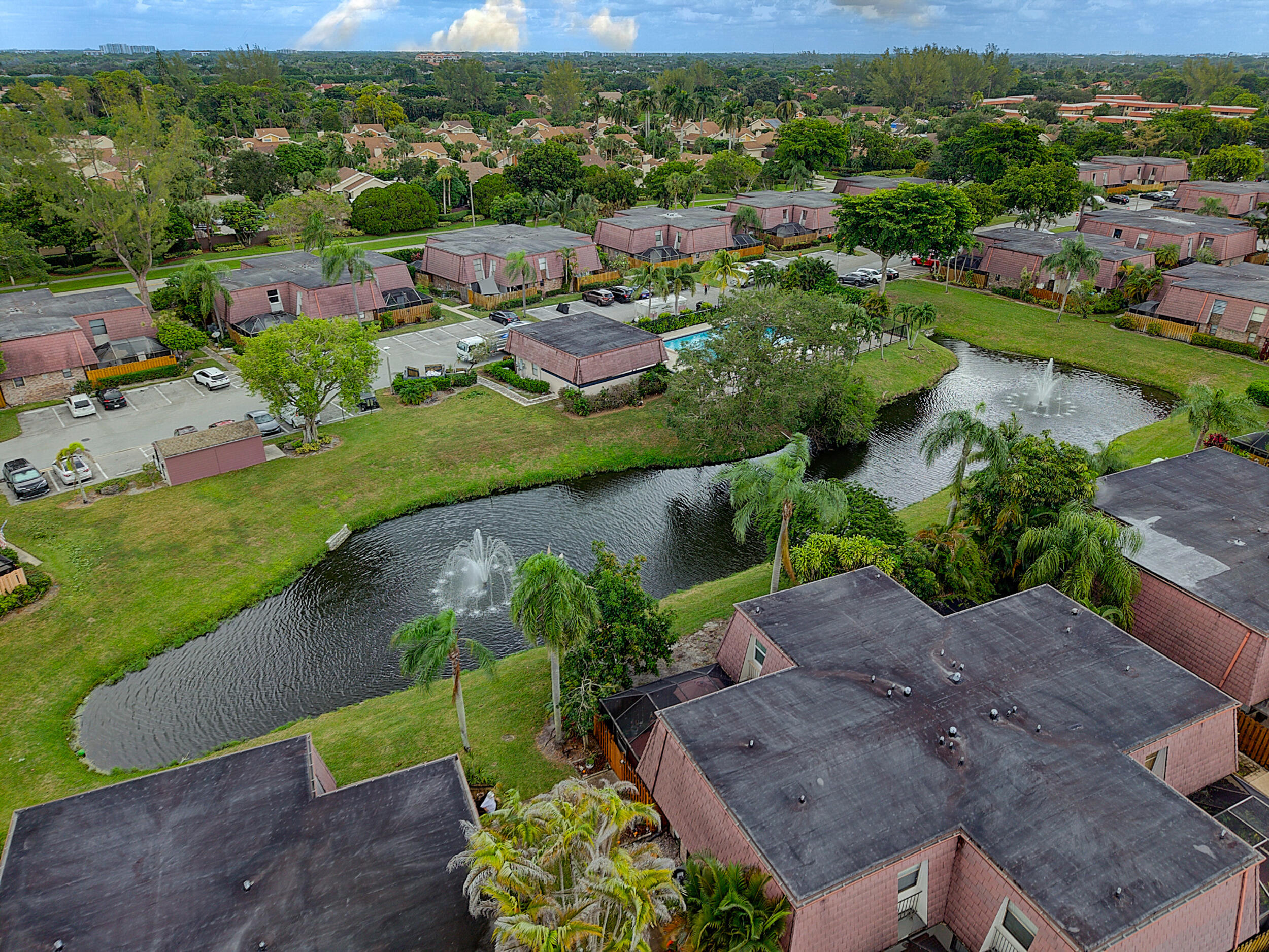 7690 Courtyard Run West Boca Raton, FL 33433 - Photo 20 of 22 an aerial view of a house with a garden