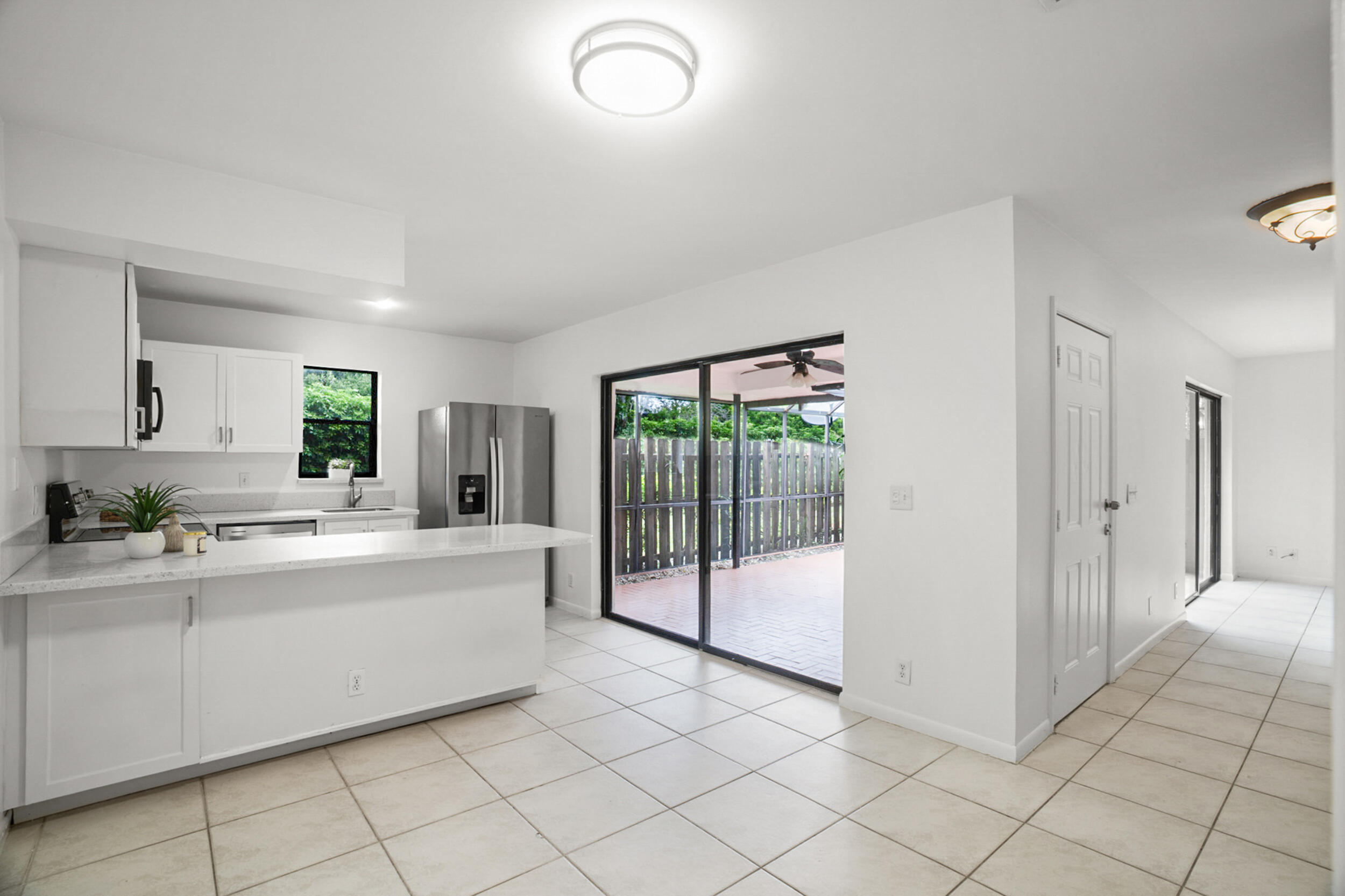 7690 Courtyard Run West Boca Raton, FL 33433 - Photo 7 of 22 a large white room with mirror