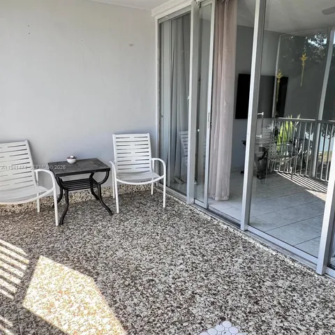 a living room with a rug