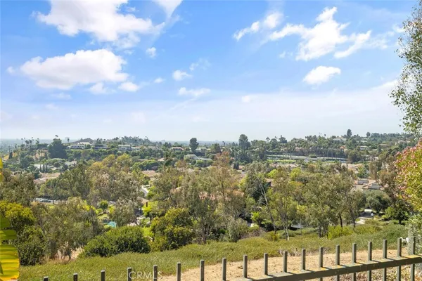 a front view of house with small garden