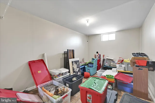 a room with furniture a rug and a wooden floor