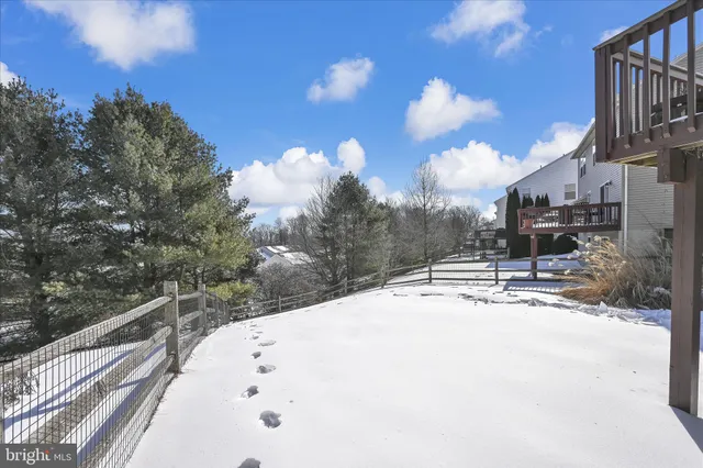 a view of a backyard of the house