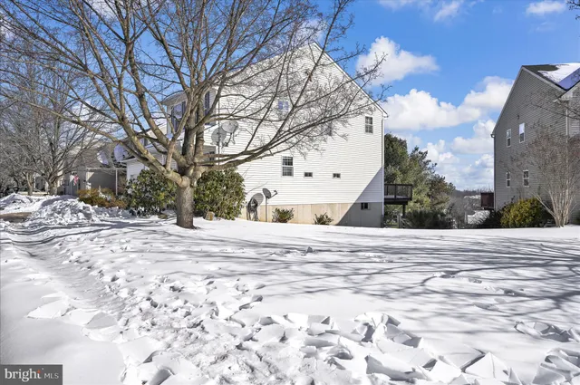 a view of a backyard of snow