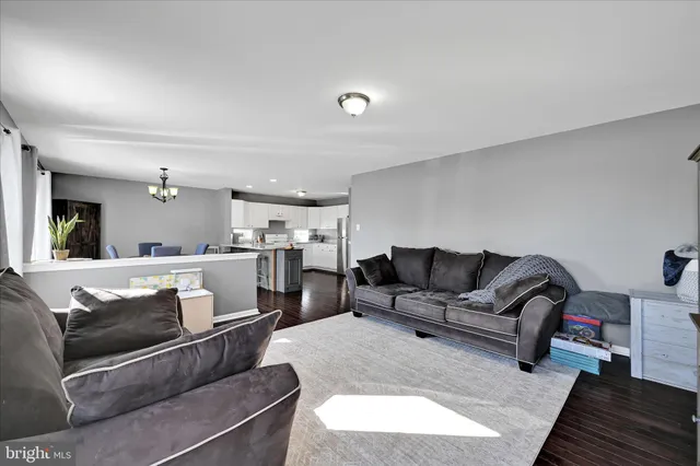 a living room with furniture and a couch