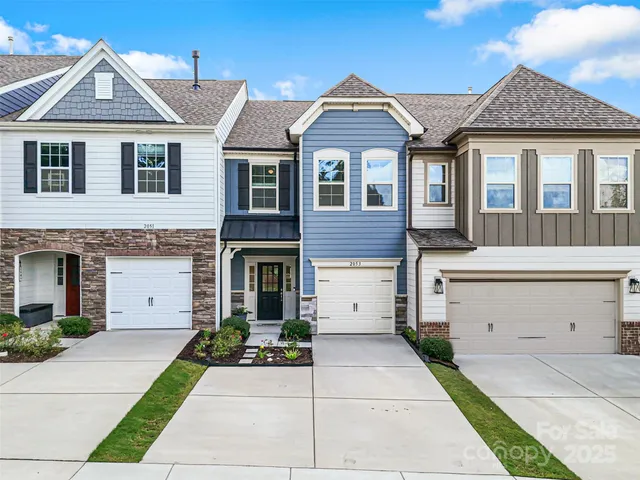 a aerial view of a house with a patio