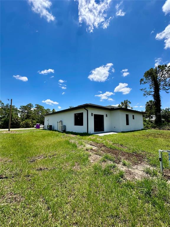 1840 Greenley Road North Port, FL 34286 - Photo 24 of 24 a view of a backyard of the house