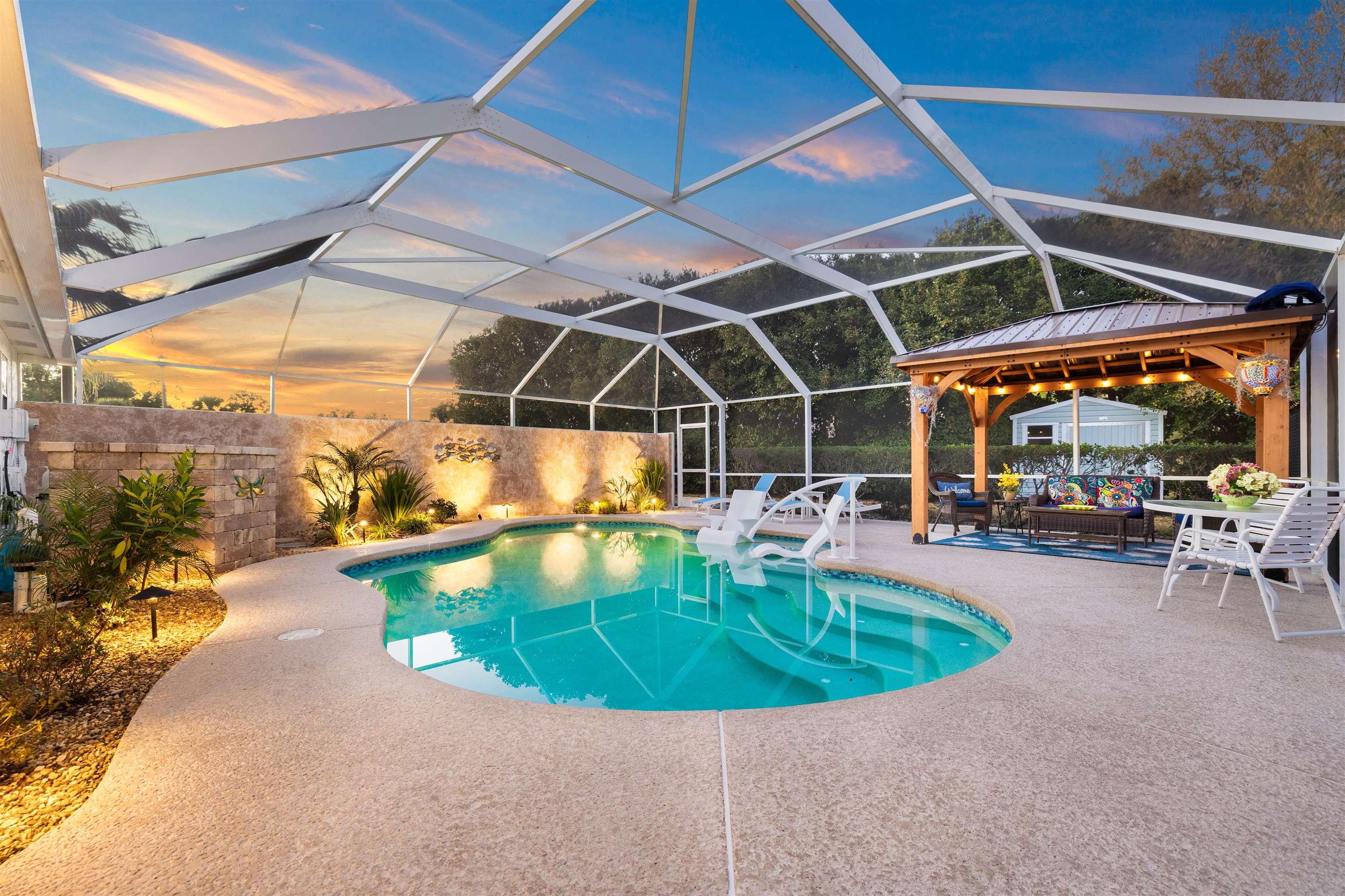 655 East Bianca Circle St. Augustine, FL 32086 - Photo 14 of 53 a view of a swimming pool with a patio