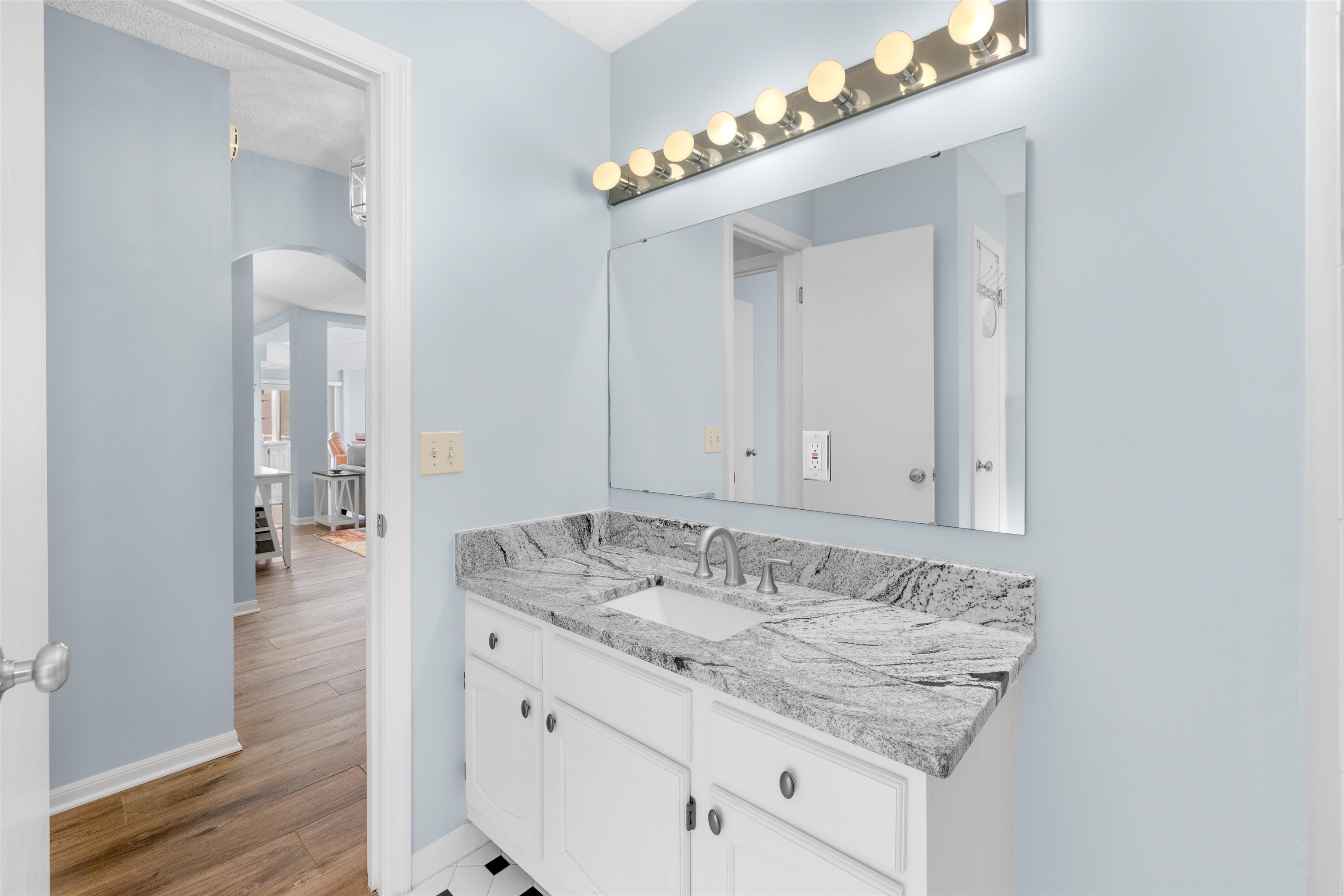 655 East Bianca Circle St. Augustine, FL 32086 - Photo 18 of 53 a bathroom with a sink and a mirror