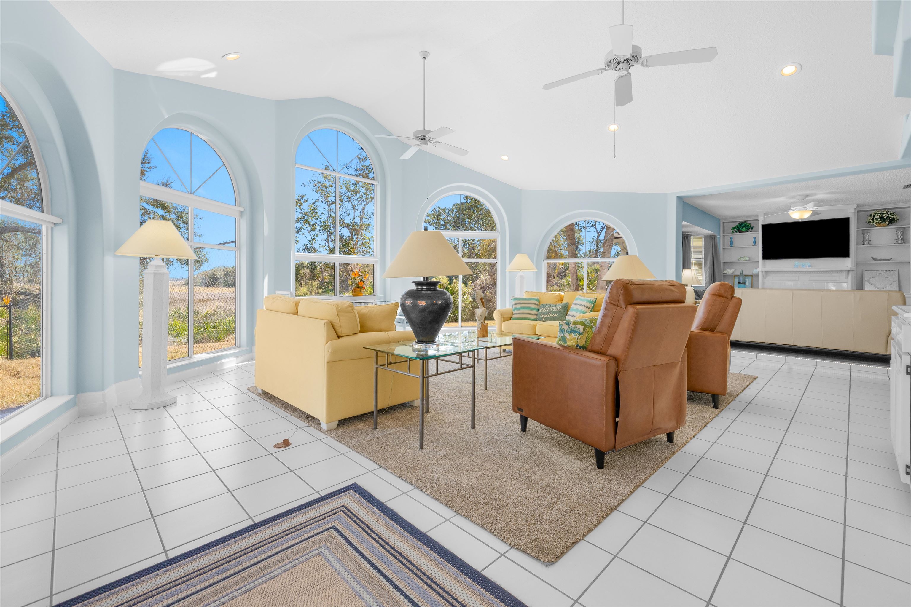 655 East Bianca Circle St. Augustine, FL 32086 - Photo 20 of 53 a living room with furniture and a flat screen tv