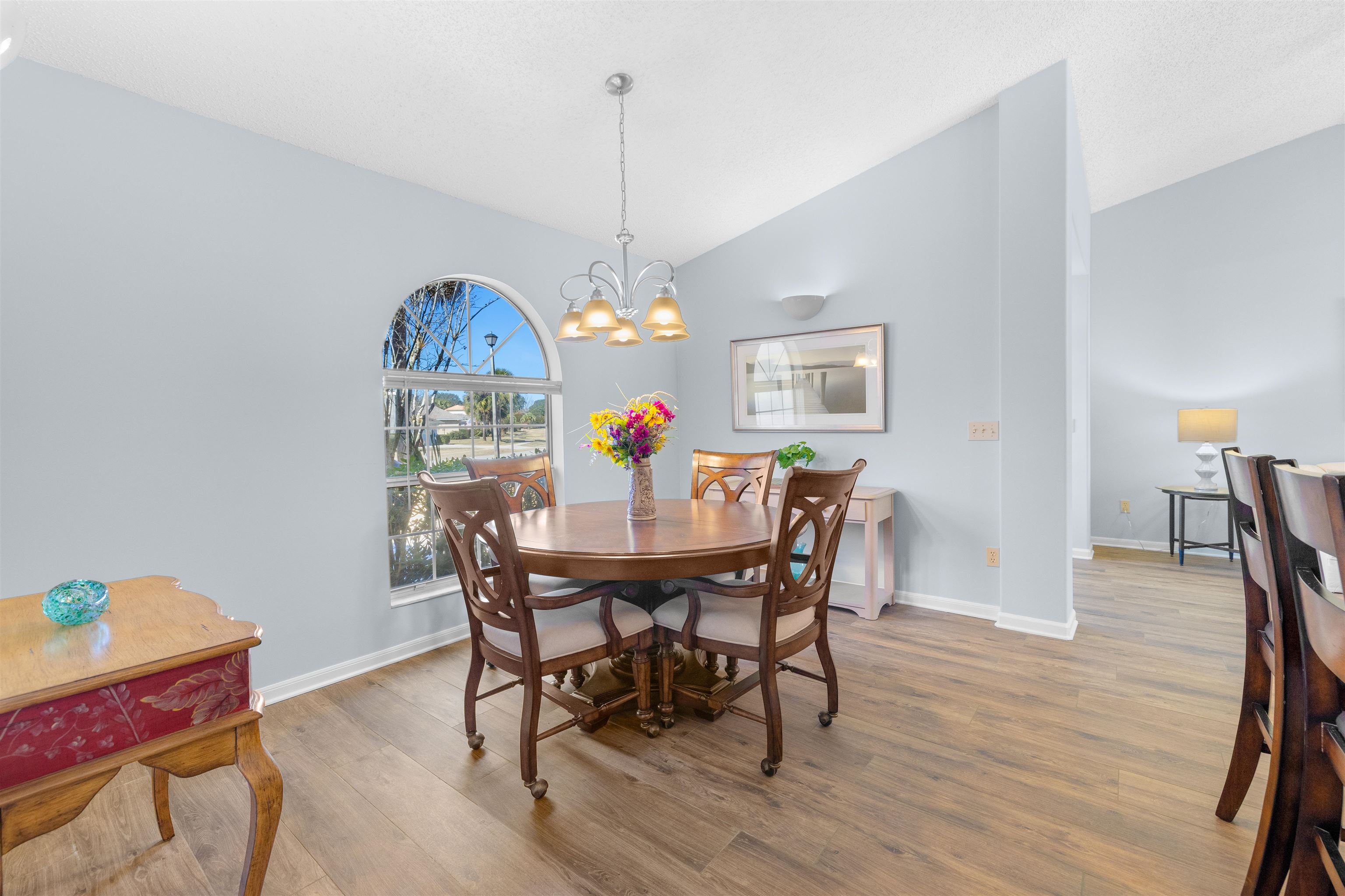 655 East Bianca Circle St. Augustine, FL 32086 - Photo 24 of 53 a view of a dining room with furniture window and wooden floor