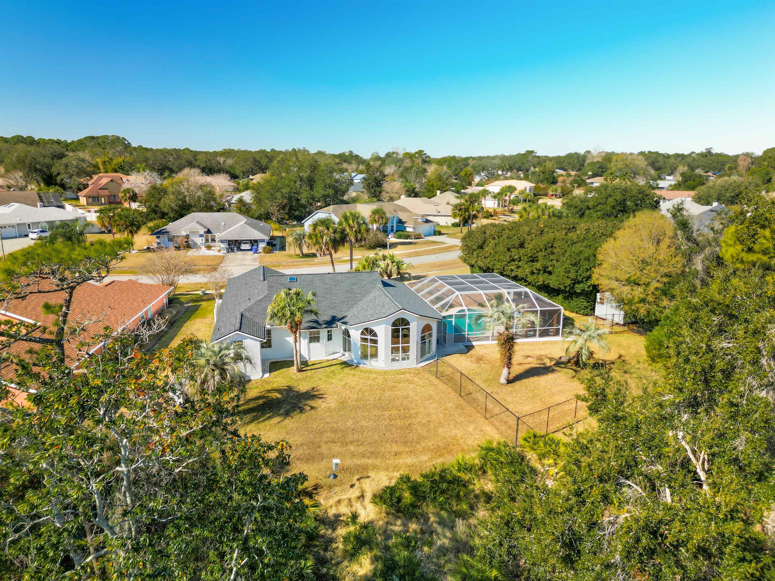 655 East Bianca Circle St. Augustine, FL 32086 - Photo 28 of 53 an aerial view of residential houses with outdoor space and trees
