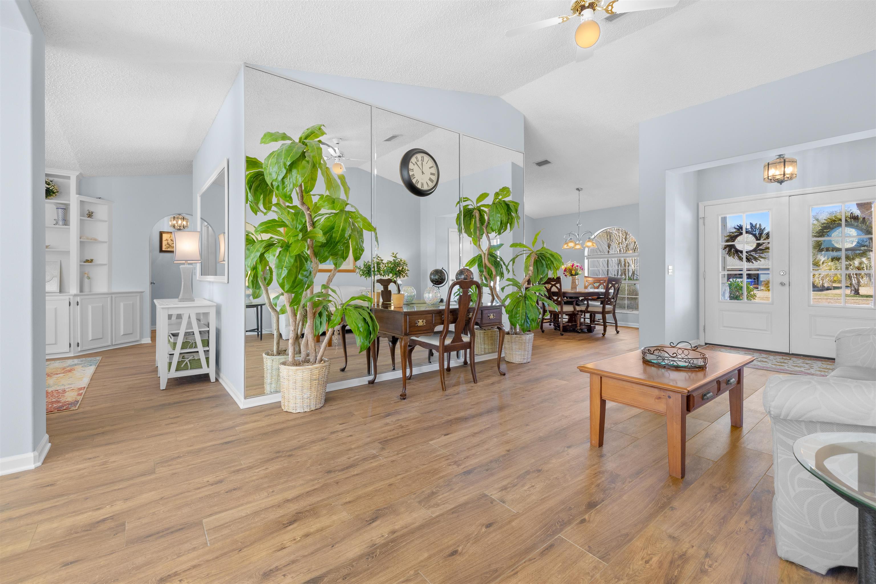 655 East Bianca Circle St. Augustine, FL 32086 - Photo 29 of 53 a dining room with furniture and wooden floor
