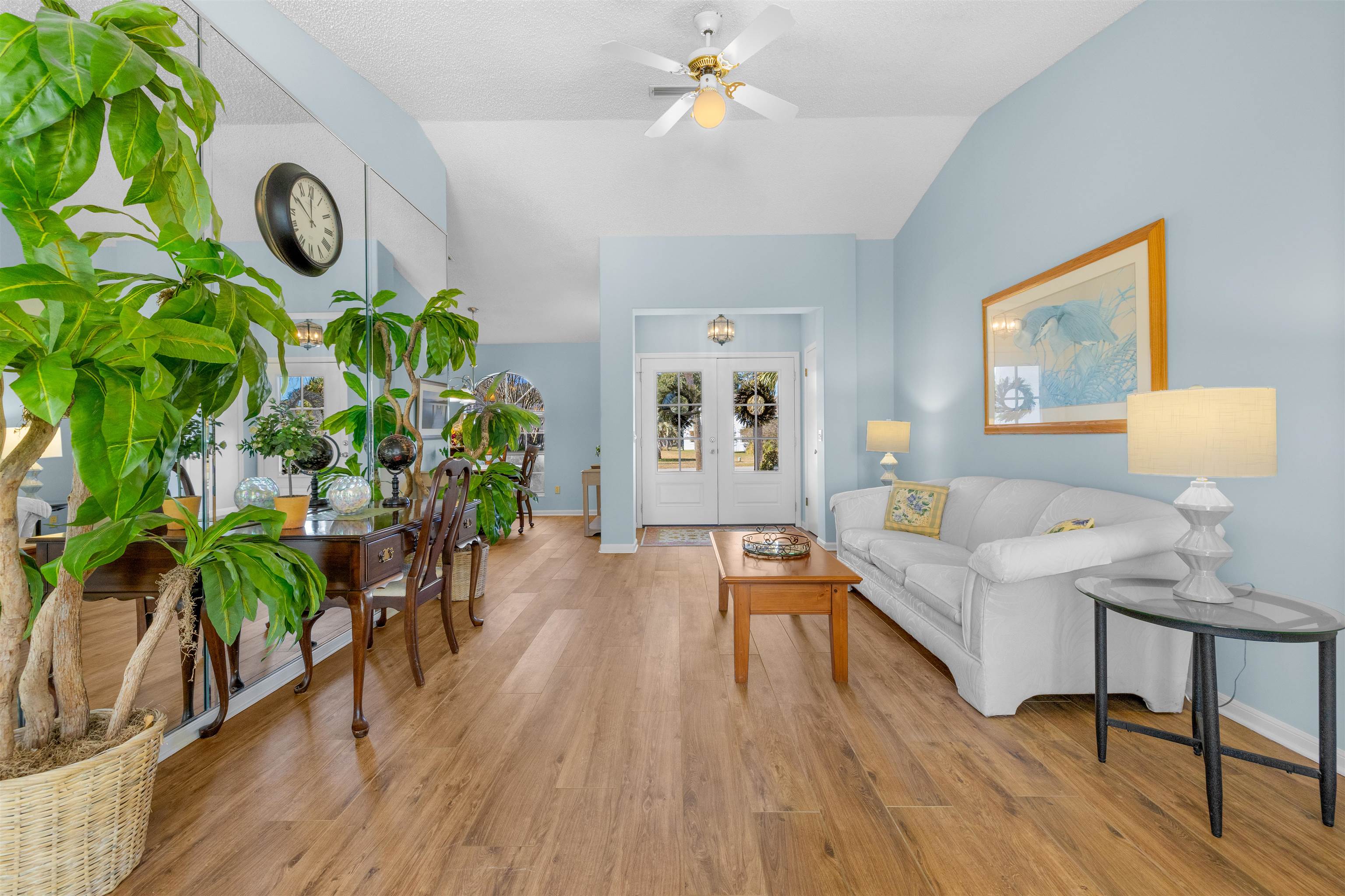 655 East Bianca Circle St. Augustine, FL 32086 - Photo 30 of 53 a living room with furniture and a potted plant