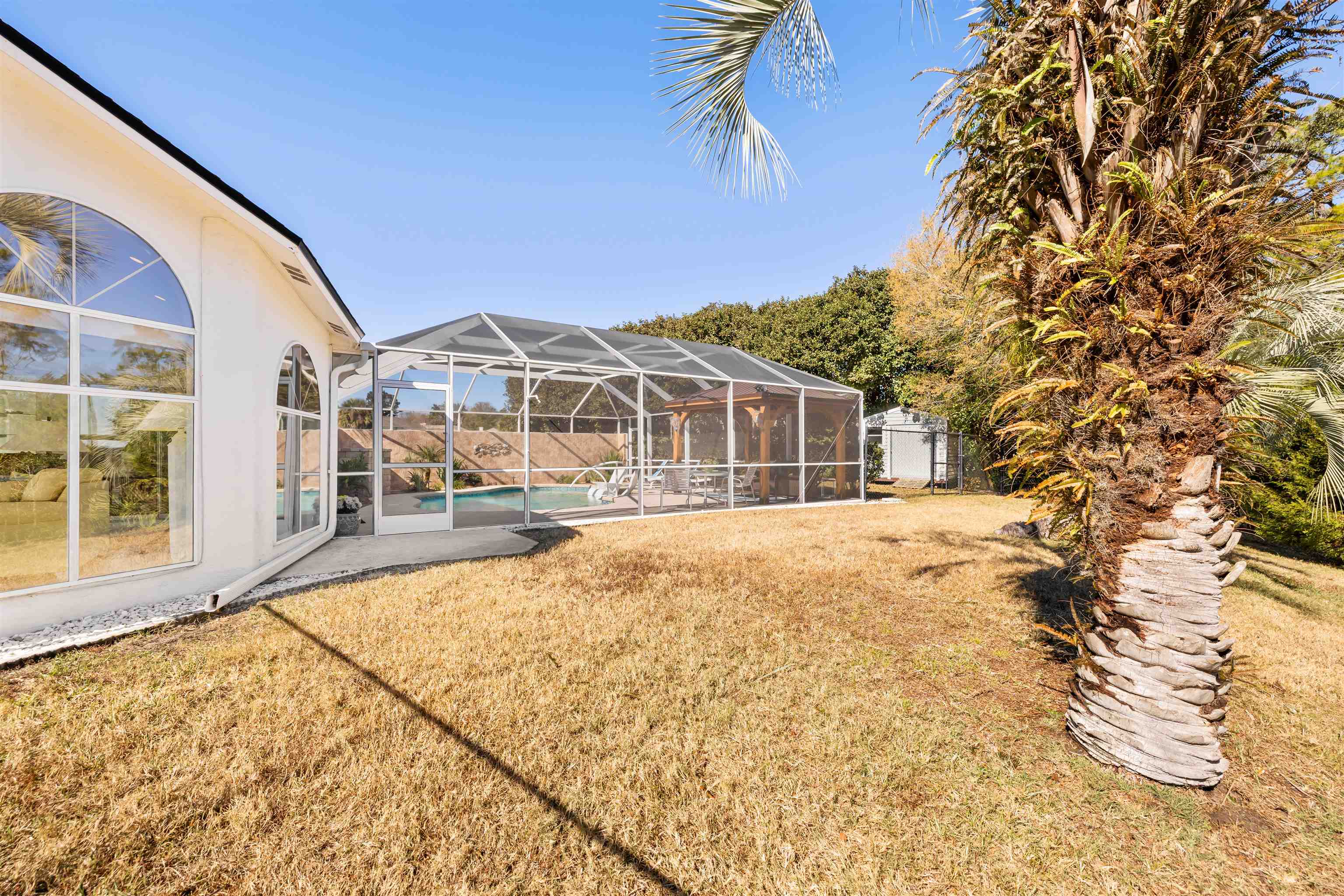 655 East Bianca Circle St. Augustine, FL 32086 - Photo 40 of 53 a front view of a house with a yard