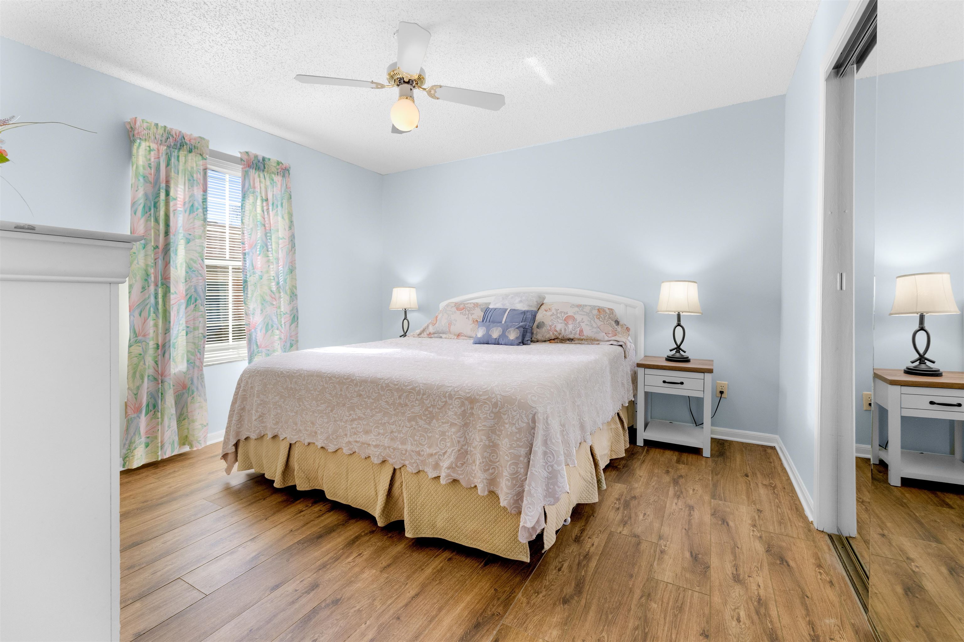 655 East Bianca Circle St. Augustine, FL 32086 - Photo 4 of 53 a spacious bedroom with a bed and wooden floor