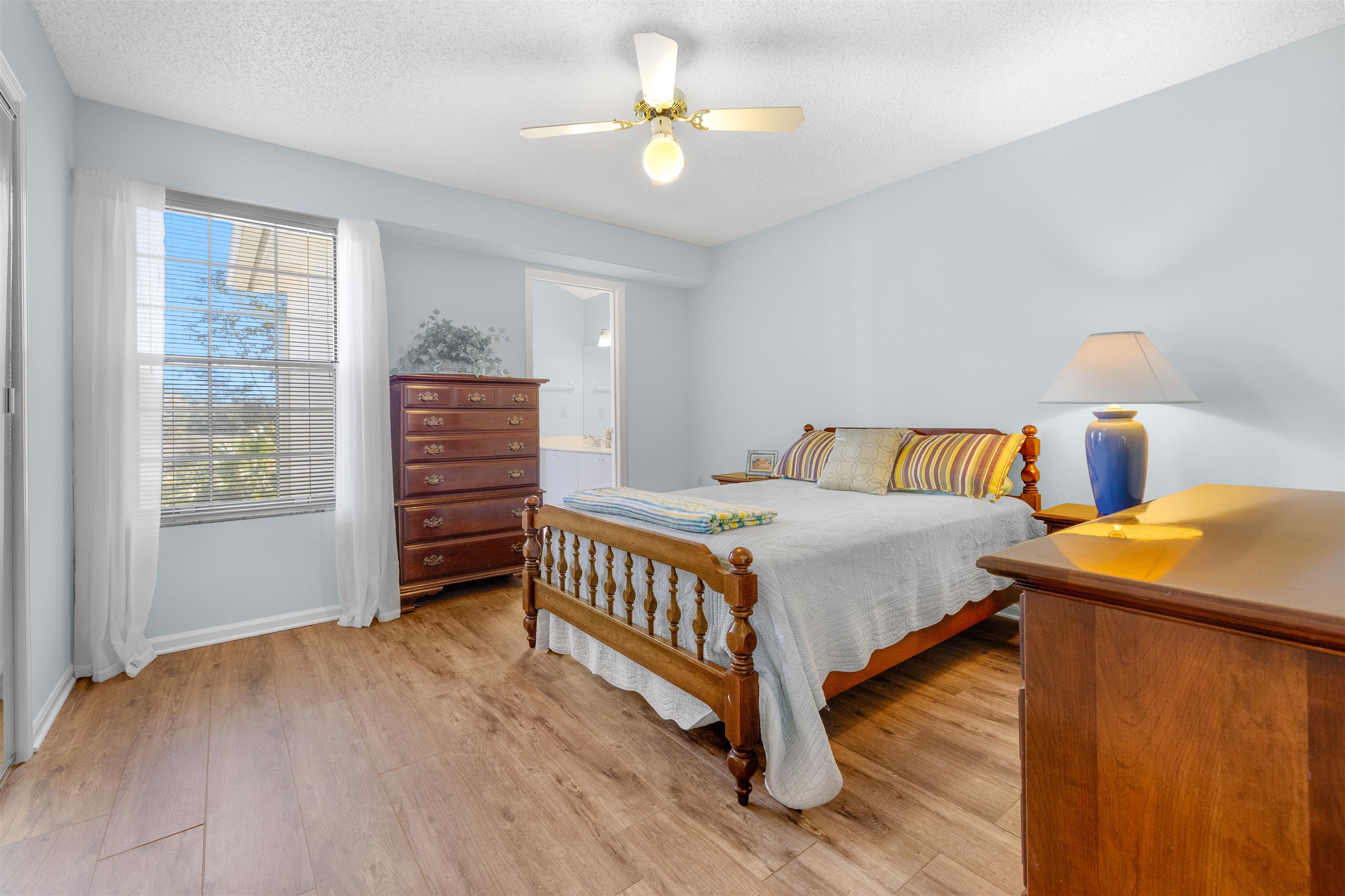 655 East Bianca Circle St. Augustine, FL 32086 - Photo 46 of 53 a bedroom with a bed and a dresser