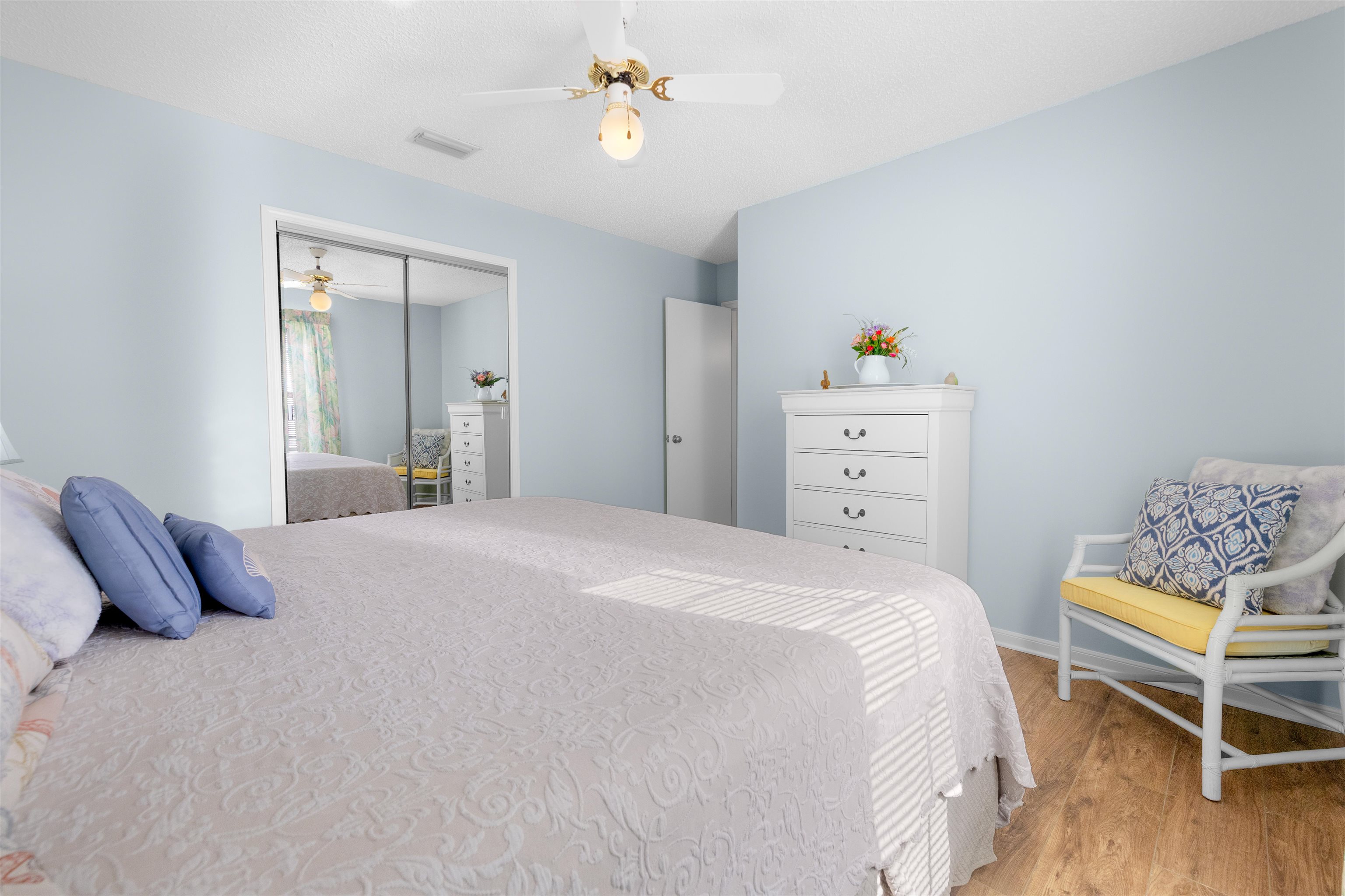 655 East Bianca Circle St. Augustine, FL 32086 - Photo 5 of 53 a bedroom with a bed and wooden floor