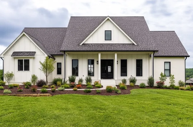 a front view of a house with a yard fire pit