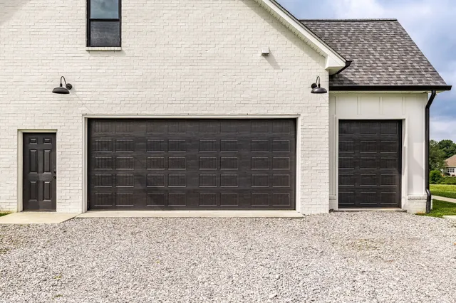 a big house with a big yard and large trees