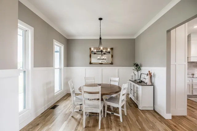 a bathroom with a sink and a large mirror