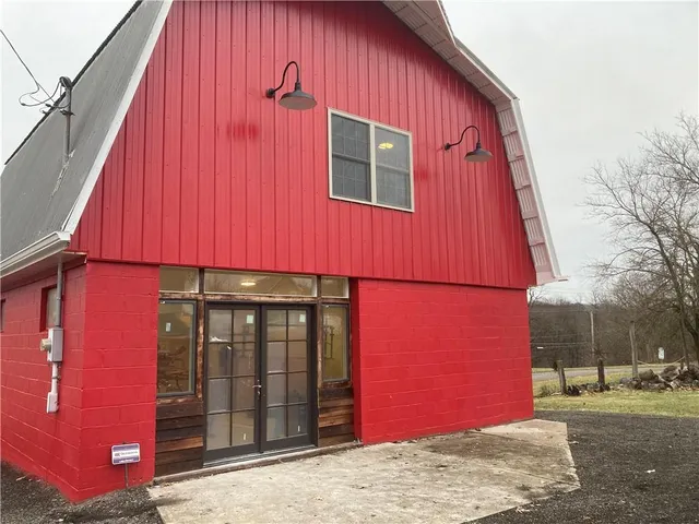 a view of a house with a street