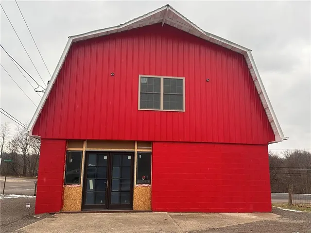 a view of a house with a garage