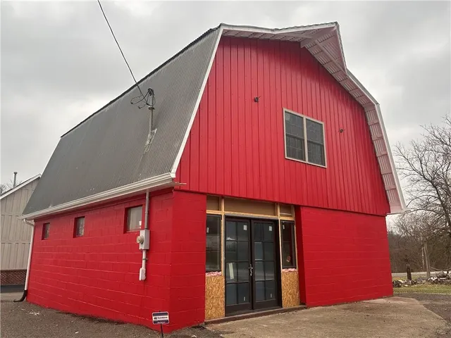 a view of a house with a garage
