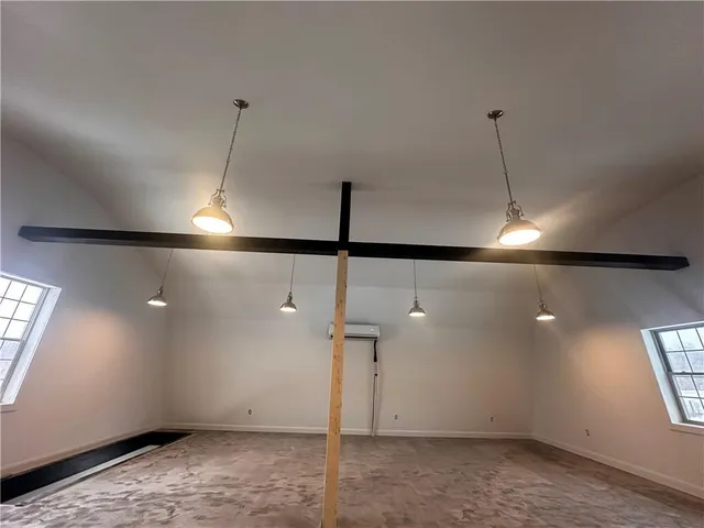 a view of a room with an empty space