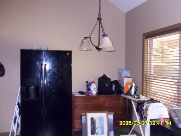 a view of entryway with a fan