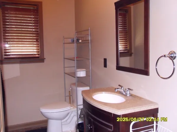 a bathroom with a sink and a toilet