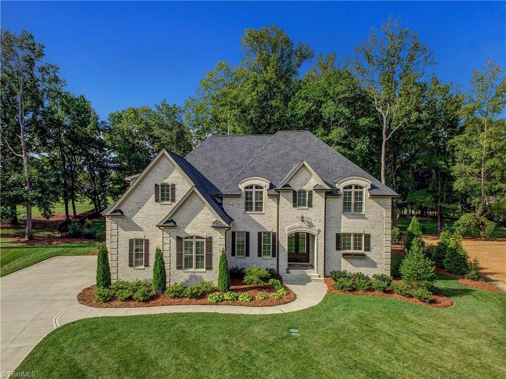 6865 Matzinger Court Oak Ridge, NC 27310 - Photo 28 of 28 Architectural flourishes grace every part of this custom R&K home. Sophisticated and luxurious, yet meets the every day needs of a busy family. Open floor plan lives large with high ceilings and spacious gathering areas.